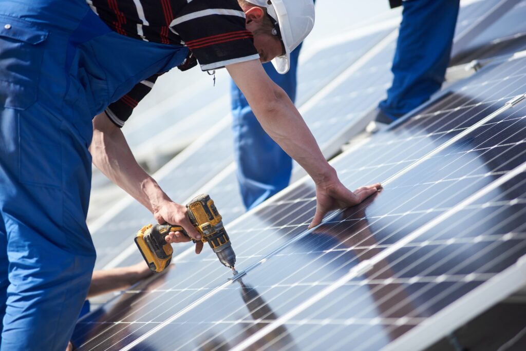 Installing solar photovoltaic panel system on roof of house