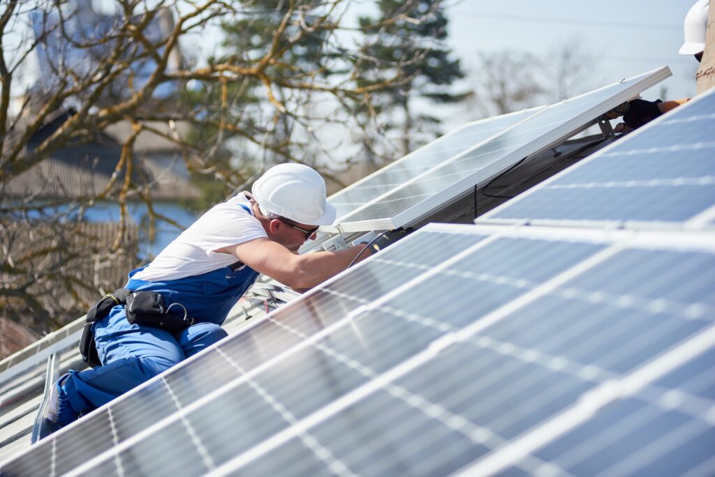 Installing solar photovoltaic panel system on roof of house